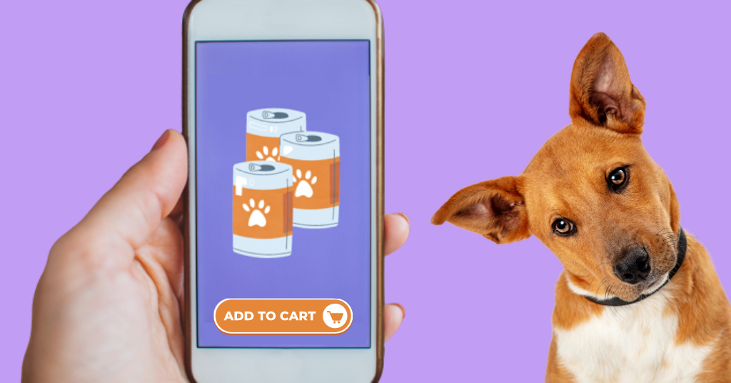 Person holding phone with mobile pet e-commerce app and a dog beside it.